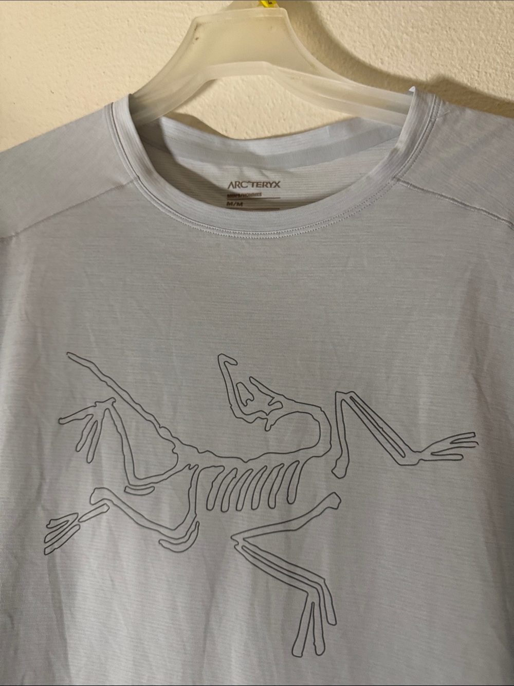Arc'teryx Light Blue Short Sleeve Tee with Outline Skeleton Graphic - Picture 2 of 9